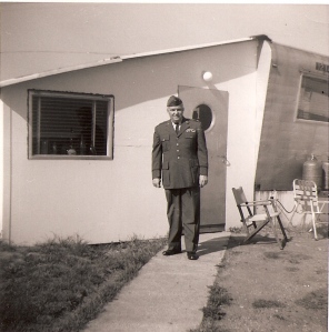 My father, standing in front of our trailer on Chambley AFB. Believe it or not, officers quarters.